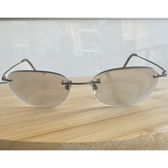 Calvin Klein Other - Calvin Klein 535 29 Unisex Eyeglasses 48-19-140 Bronze Rimless Japan FRAMES ONLY